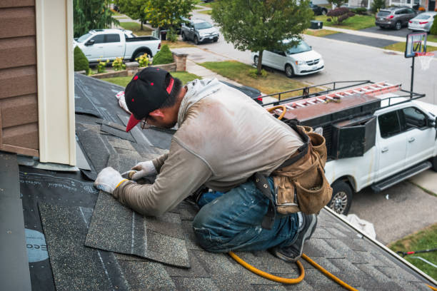 Professional Roofing technician working in Burbank, OH